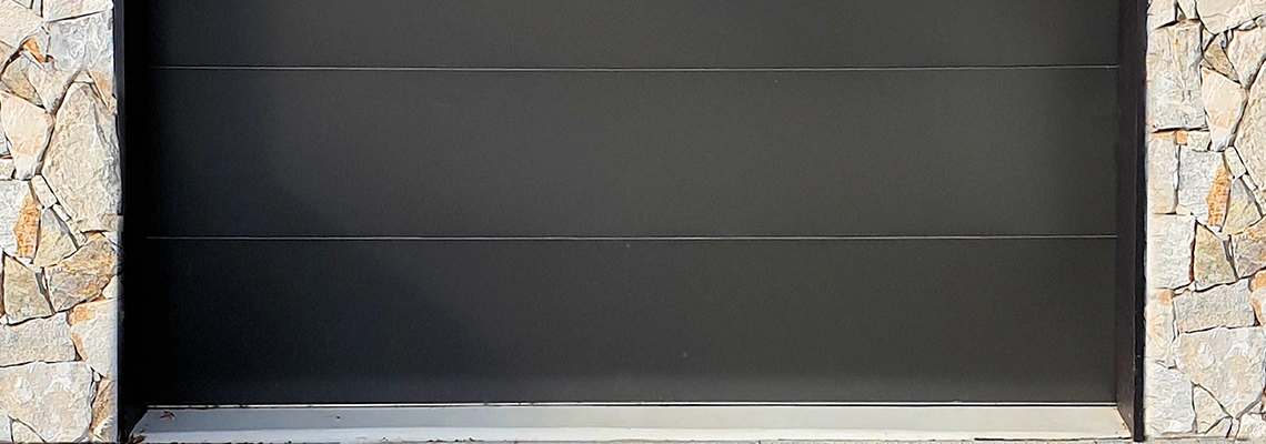 Overhead Black Garage Door Installation in North Port, Florida