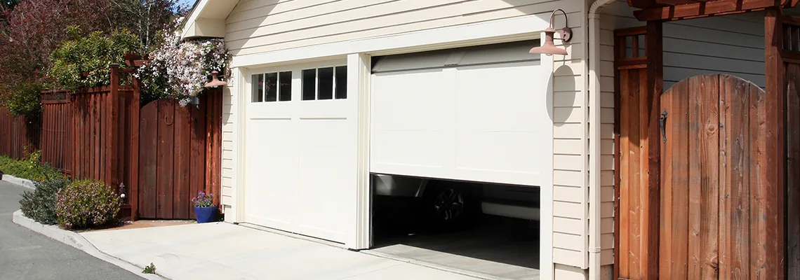 Fix Metal Garage Door Jerking in North Port